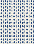 Dot Column Porcelain dotted wallpaper in porcelain and navy