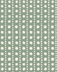 Dot Column Sage dotted wallpaper in sage and cream