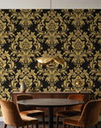Dreamy Fern Dial Gilt fern damask wallpaper behind a walnut credenza and round table in an elegant dining room
