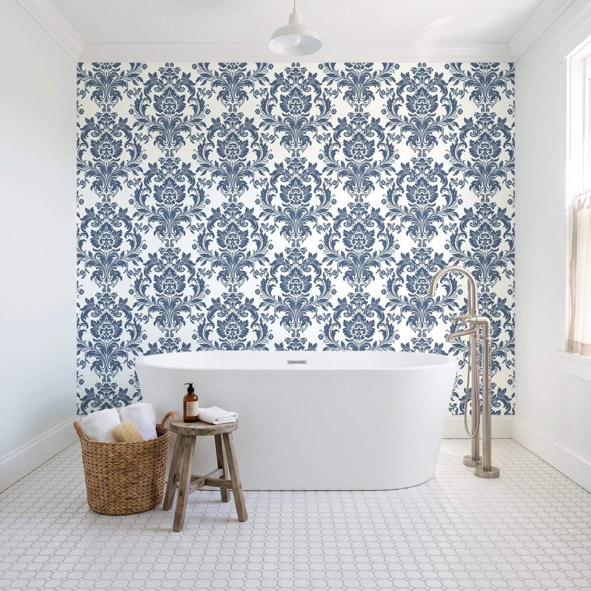 Dreamy Fern Dial Slate fern damask wallpaper behind a freestanding tub in a bright coastal bathroom