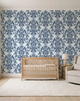 Dreamy Fern Dial Slate fern damask wallpaper in a calm, light-filled nursery
