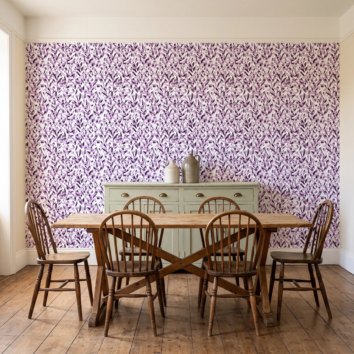 Drifting Petals Plum abstract petal wallpaper in a farmhouse dining room with a sage sideboard and rustic trestle table