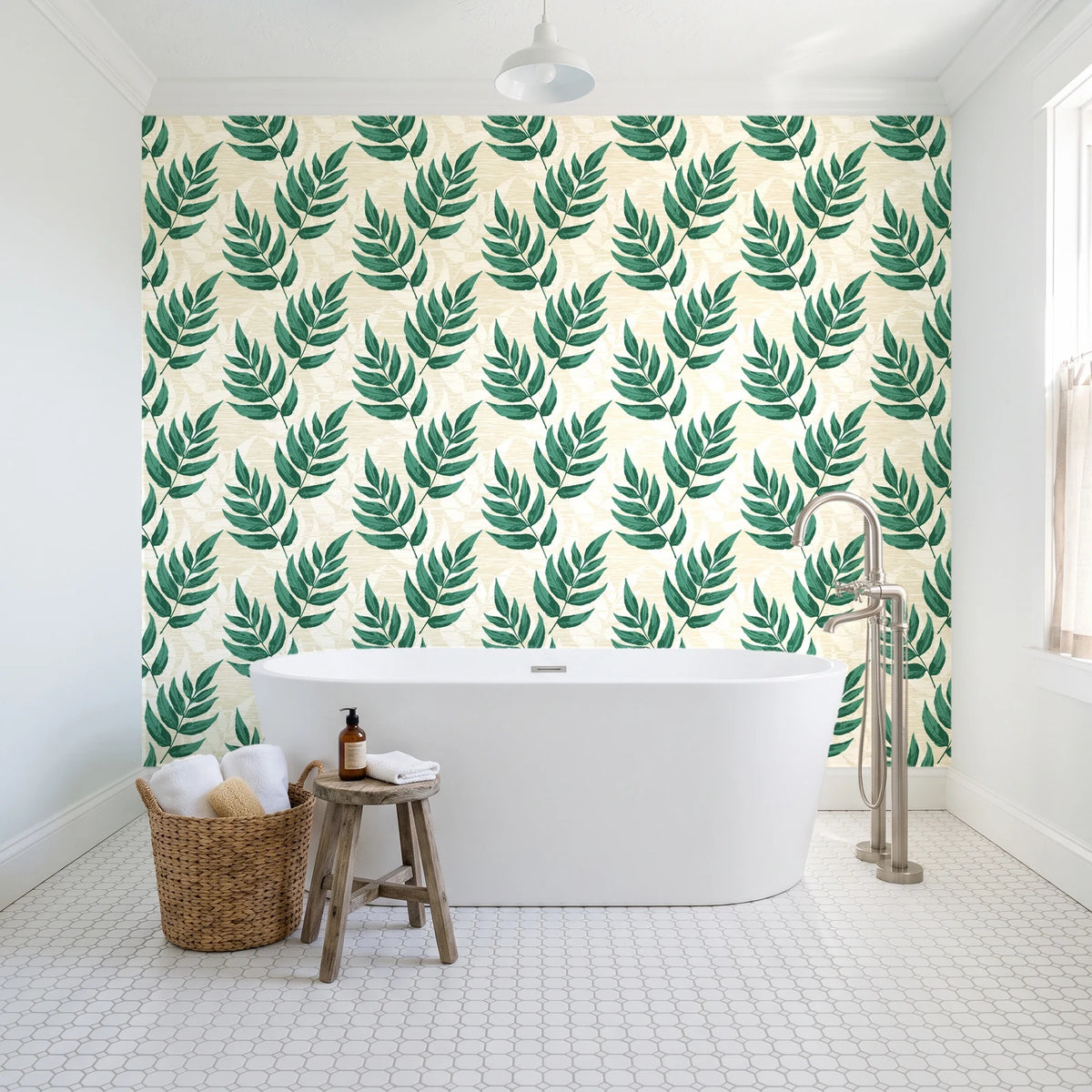 Driftwood Fern Emerald fern frond wallpaper behind a freestanding tub in a bright coastal bathroom