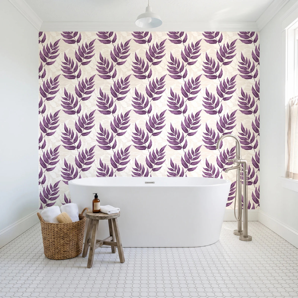 Driftwood Fern Plum fern frond wallpaper behind a freestanding tub in a bright coastal bathroom
