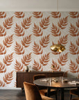 Driftwood Fern Terracotta fern frond wallpaper in an elegant dining room