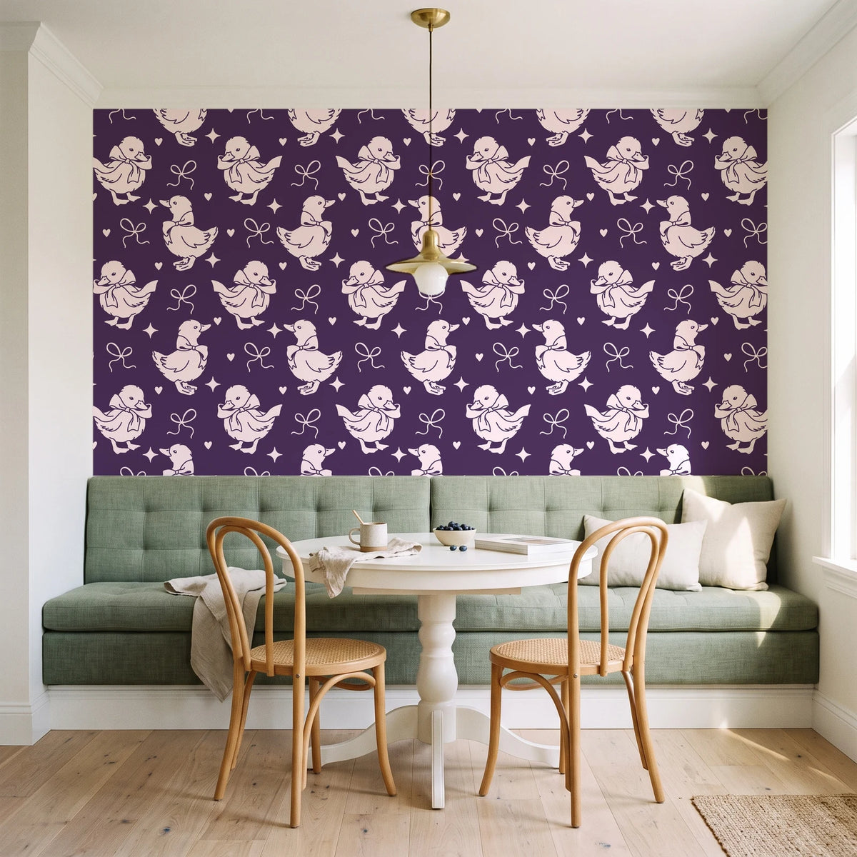 Duckling Waltz Plum ducklings wallpaper as a feature wall in a sunlit breakfast nook