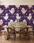 Duckling Waltz Plum ducklings wallpaper in a farmhouse dining room with a sage sideboard and rustic trestle table