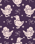 Duckling Waltz Plum ducklings wallpaper in plum and blush