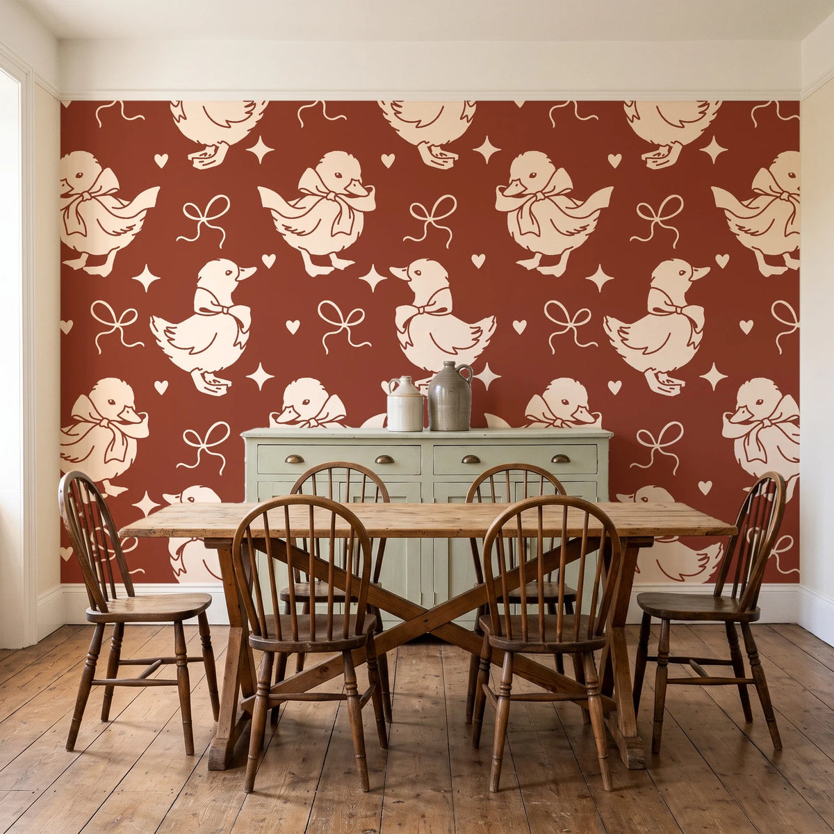 Duckling Waltz Rust ducklings wallpaper in a farmhouse dining room with a sage sideboard and rustic trestle table
