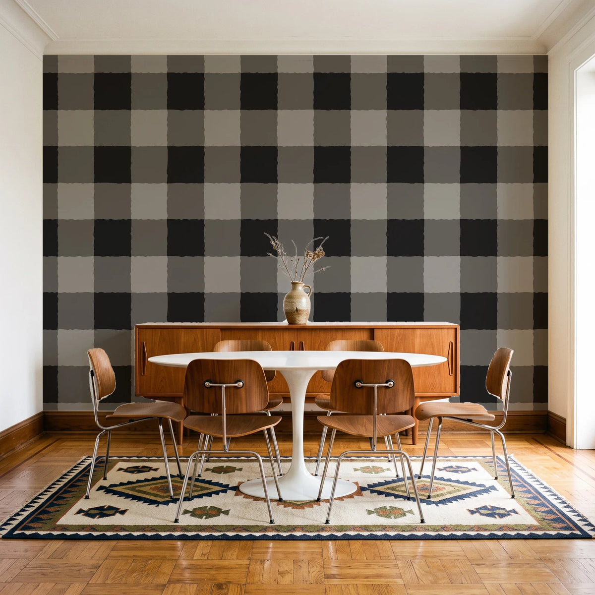 Dune Plaid Charcoal gingham check wallpaper in a mid-century dining room with a teak sideboard and tulip table