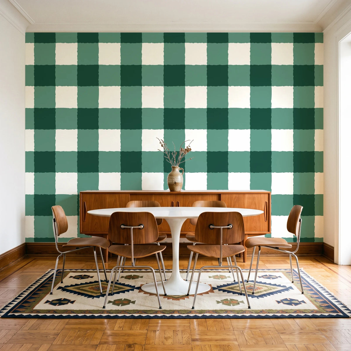 Dune Plaid Emerald gingham check wallpaper in a mid-century dining room with a teak sideboard and tulip table