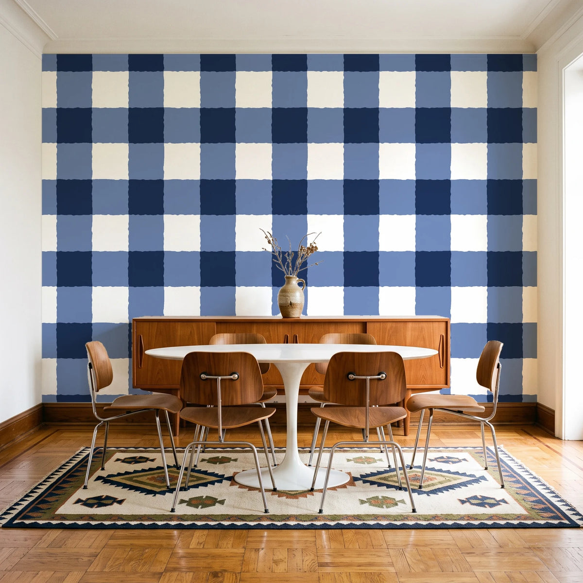 Dune Plaid Navy gingham check wallpaper in a mid-century dining room with a teak sideboard and tulip table