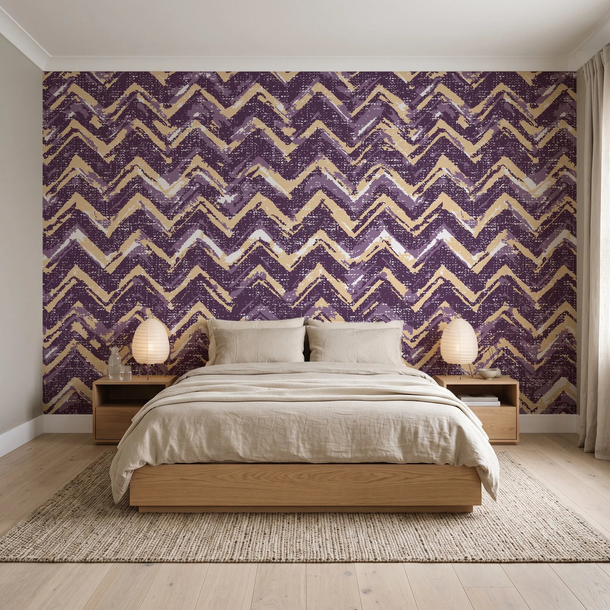 Dusk Passage Plum chevron wallpaper behind a low platform bed in a serene Japandi bedroom