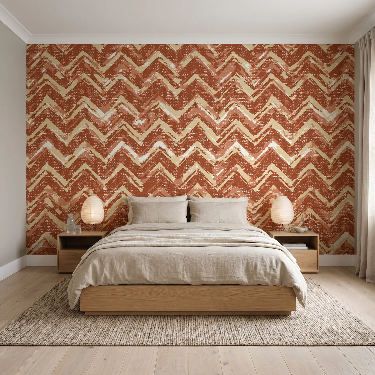 Dusk Passage Terracotta chevron wallpaper behind a low platform bed in a serene Japandi bedroom
