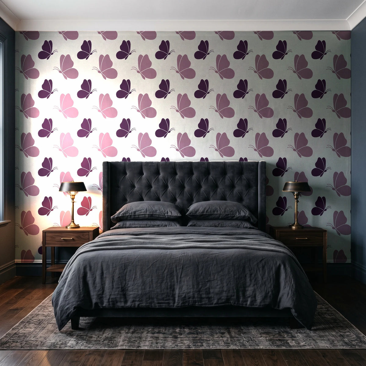 Dust & Wing Plum butterflies wallpaper behind a tufted headboard in a dark, moody bedroom