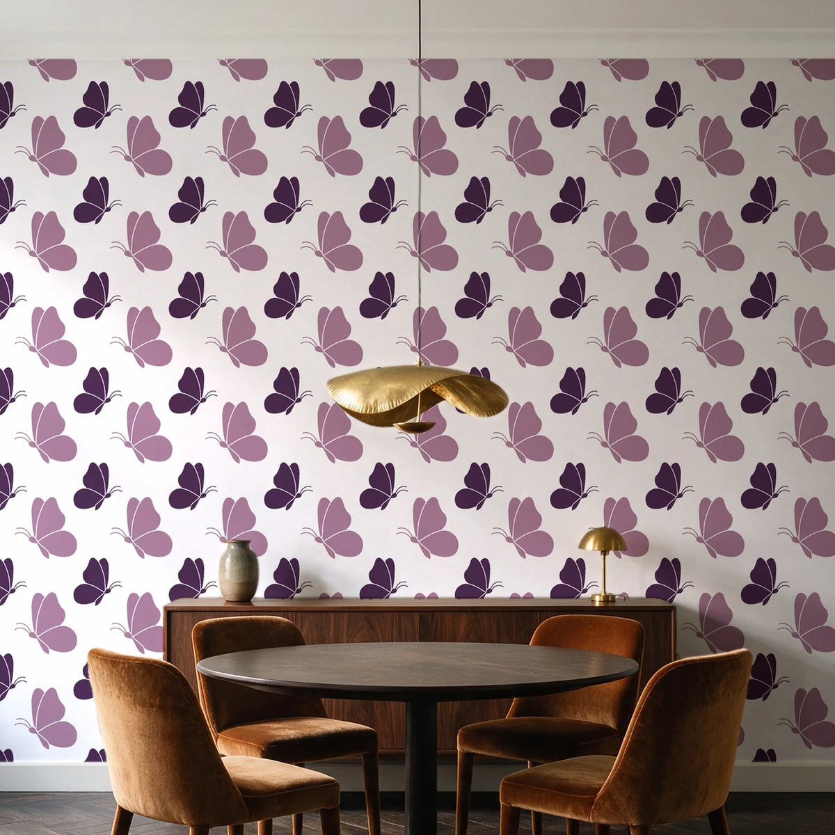 Dust & Wing Plum butterflies wallpaper behind a walnut credenza and round table in an elegant dining room