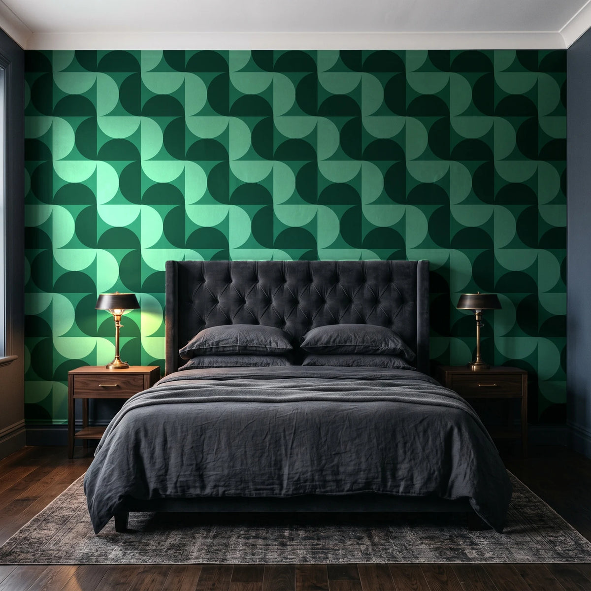 Ember Mosaic Emerald retro geometric wallpaper behind a tufted headboard in a dark, moody bedroom