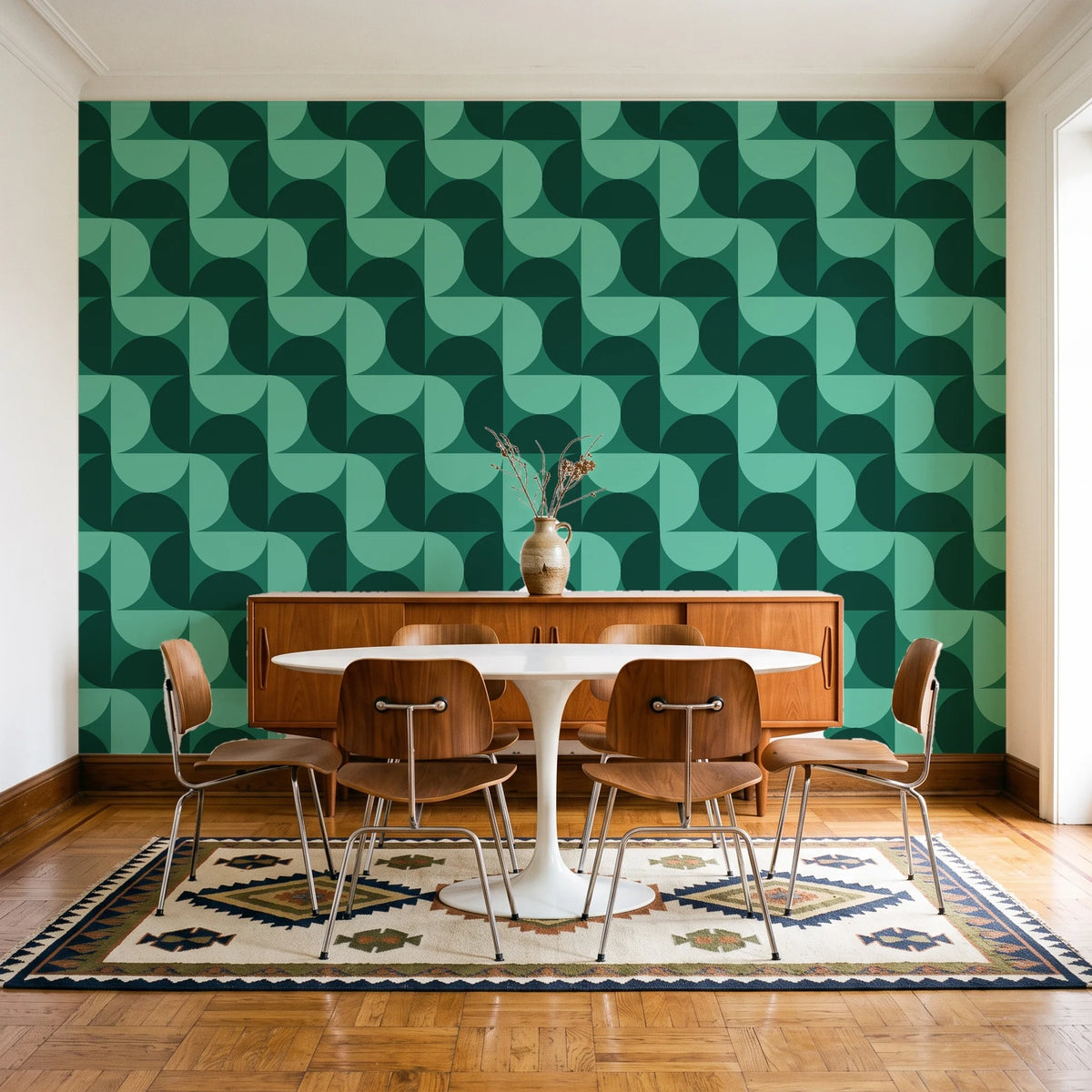 Ember Mosaic Emerald retro geometric wallpaper in a mid-century dining room with a teak sideboard and tulip table