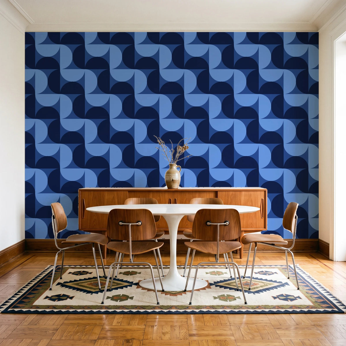 Ember Mosaic Midnight retro geometric wallpaper in a mid-century dining room with a teak sideboard and tulip table