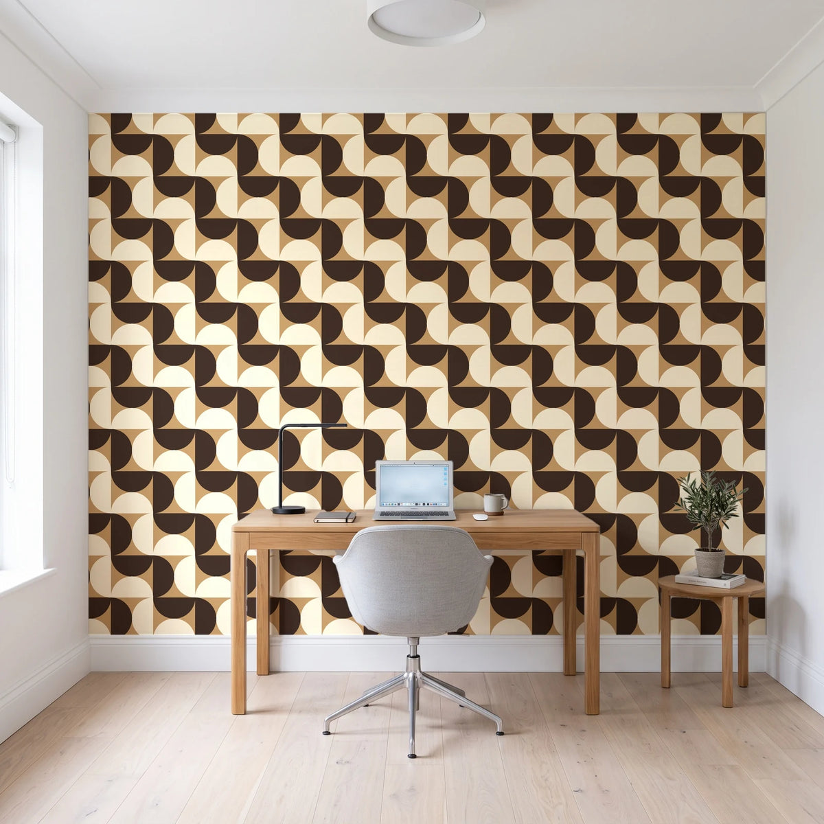 Ember Mosaic Mocha retro geometric wallpaper behind a modern oak desk in a bright home office