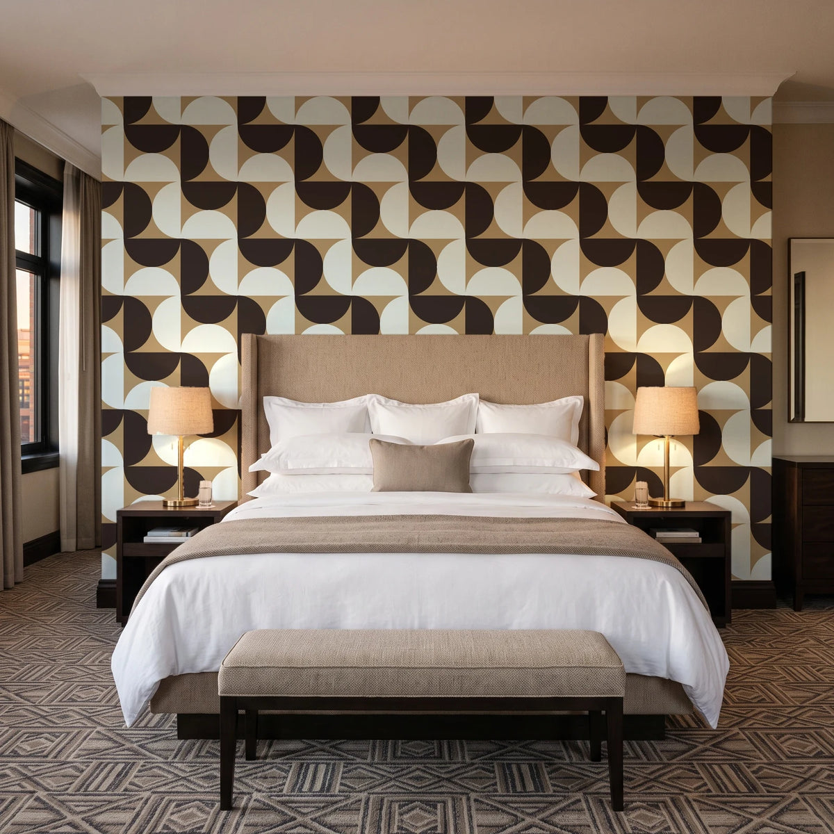 Ember Mosaic Mocha retro geometric wallpaper behind the headboard of a king bed in a contemporary hotel guest room