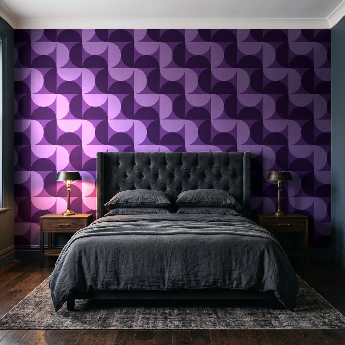 Ember Mosaic Plum retro geometric wallpaper behind a tufted headboard in a dark, moody bedroom