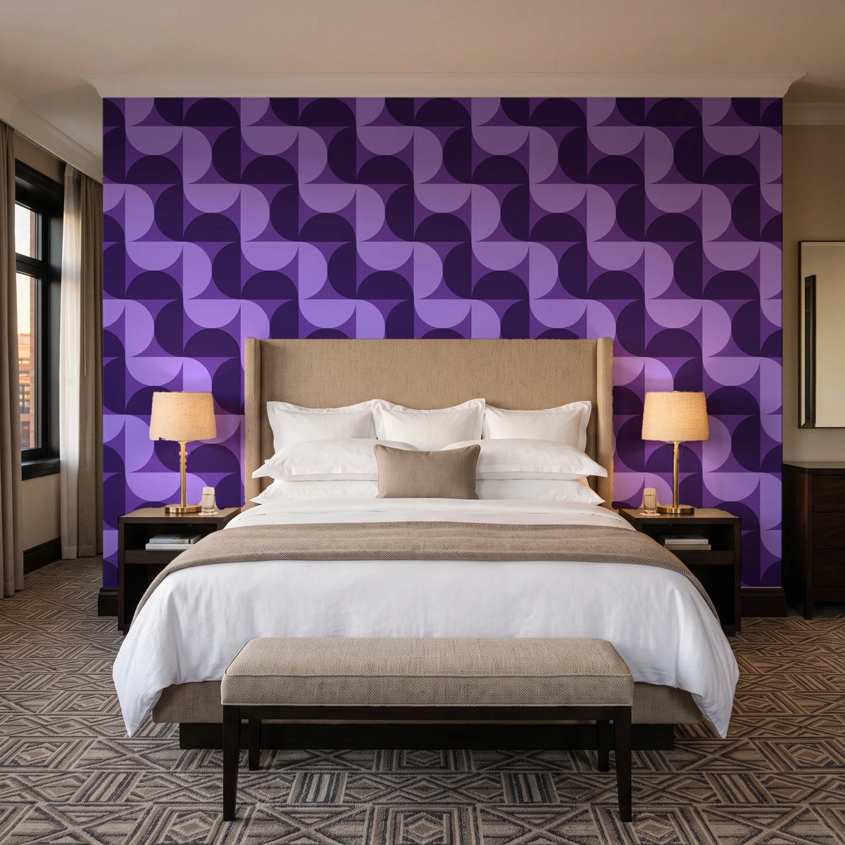 Ember Mosaic Plum retro geometric wallpaper behind the headboard of a king bed in a contemporary hotel guest room