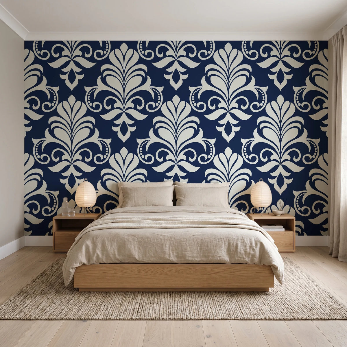 Ethereal Flowers Midnight damask wallpaper behind a low platform bed in a serene Japandi bedroom