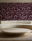Evening Garden Oxblood botanical floral wallpaper in an elegant living room