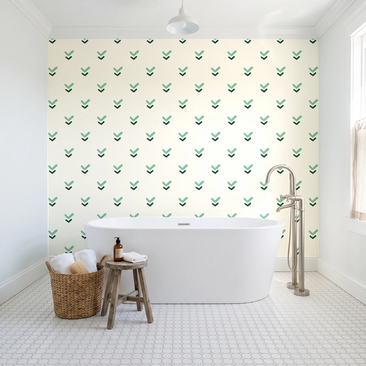Falling Grace Emerald chevron wallpaper behind a freestanding tub in a bright coastal bathroom