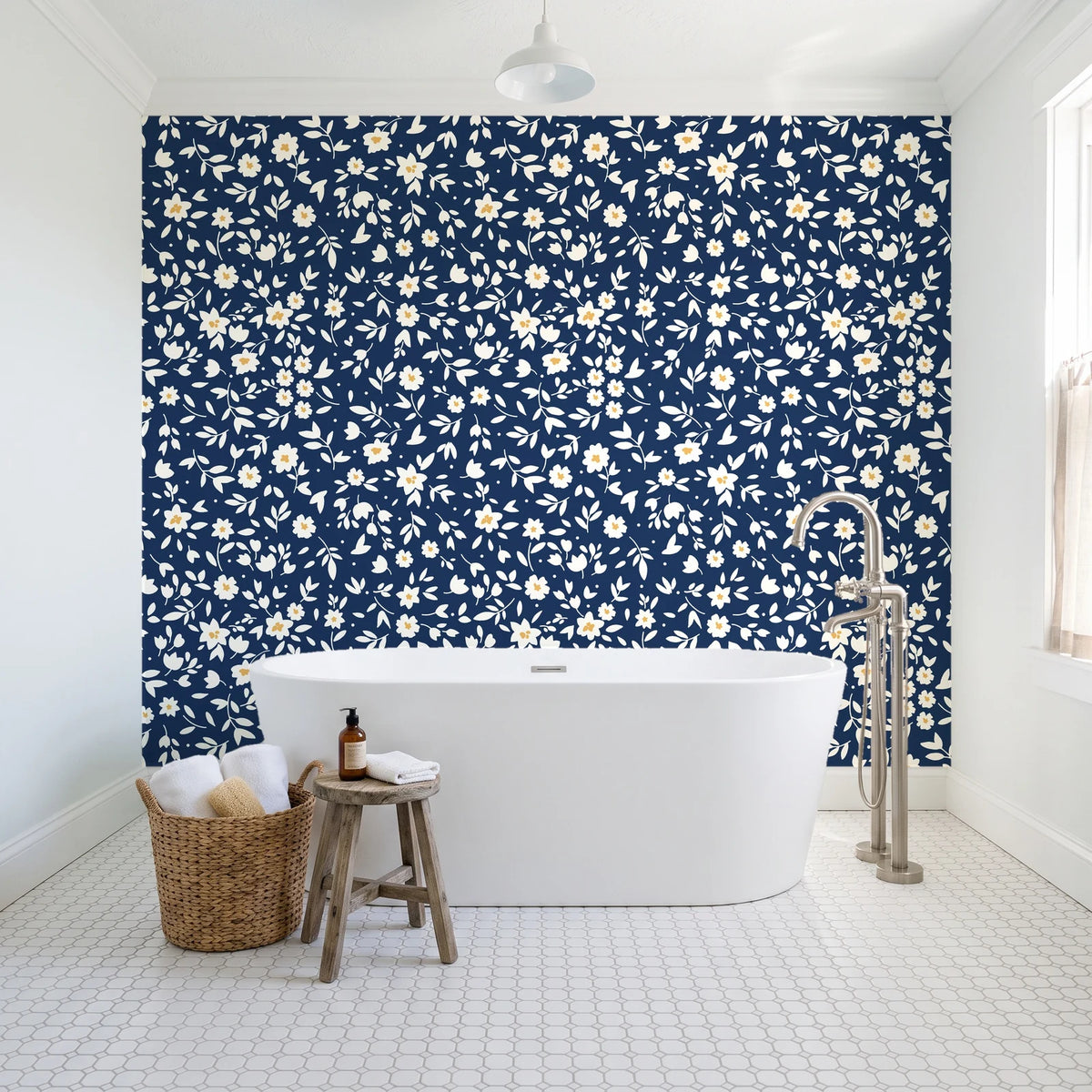 First Bloom Navy ditsy floral wallpaper behind a freestanding tub in a bright coastal bathroom