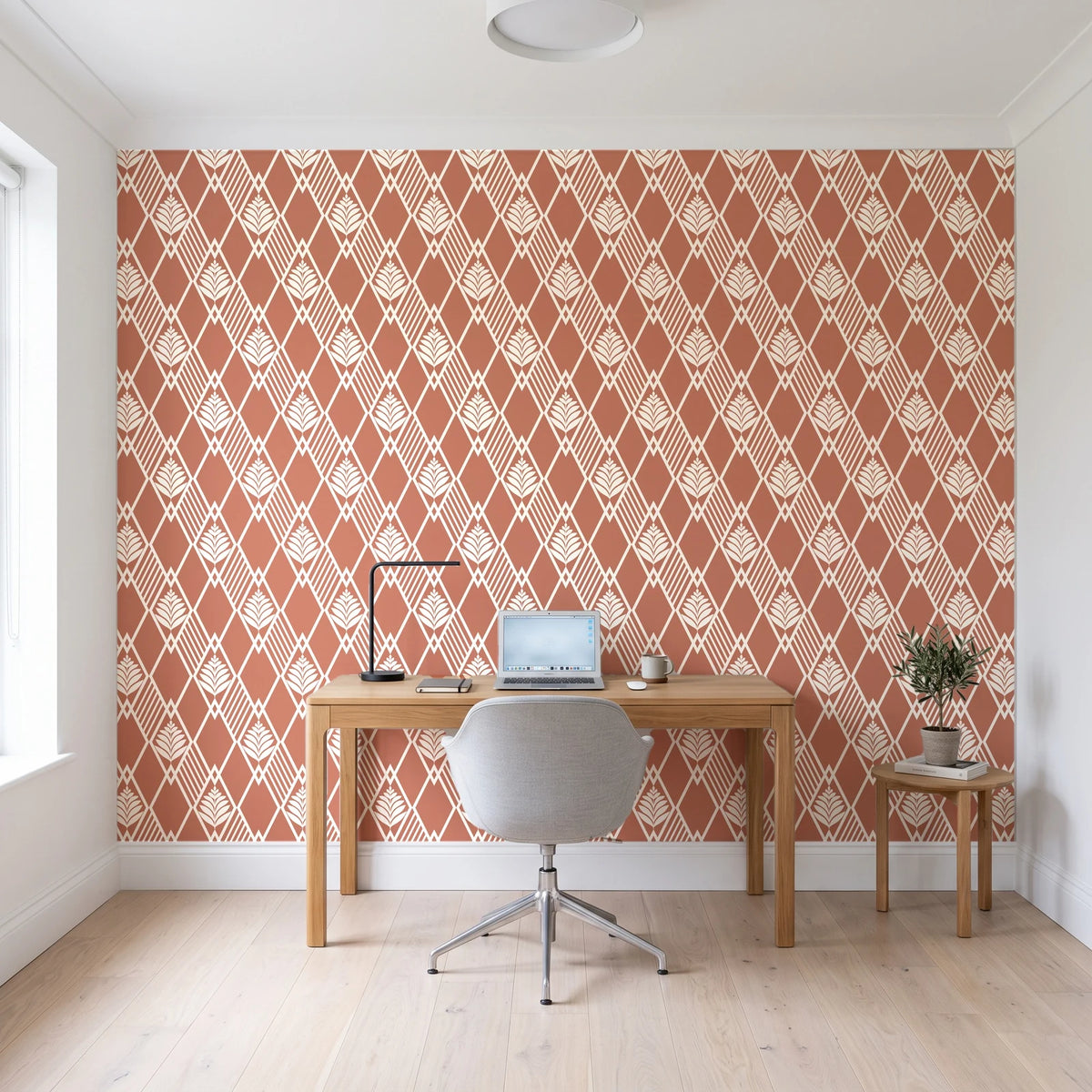 Floral Fantasia Clay diamond lattice wallpaper behind a modern oak desk in a bright home office