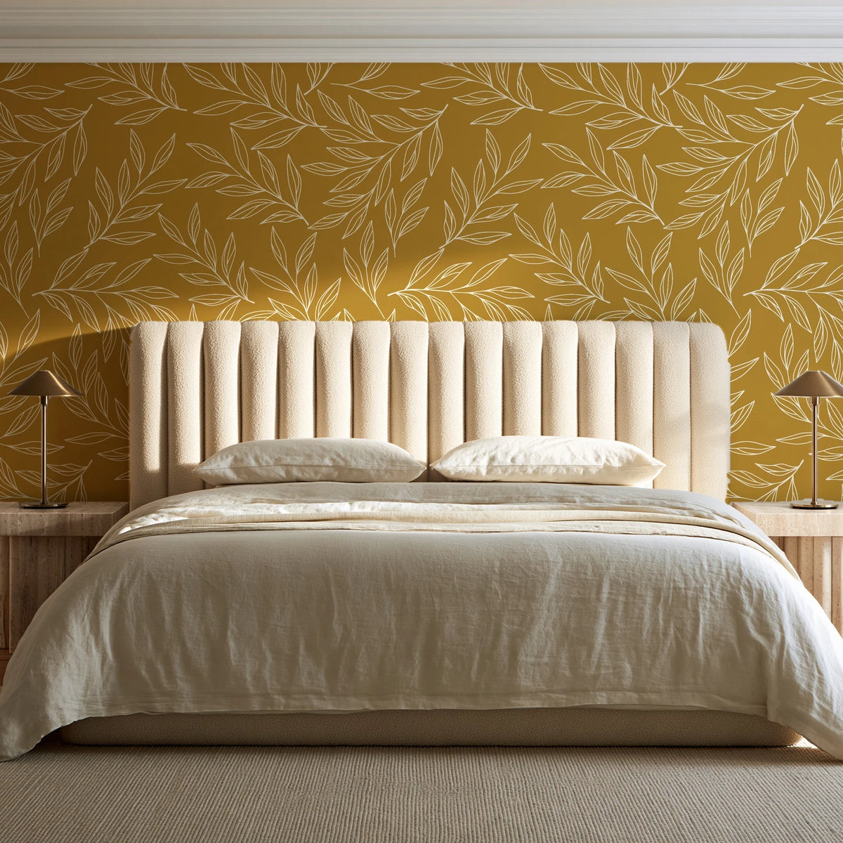 Forest Leaf Ochre botanical leaf wallpaper behind a channel-tufted bed in a calm primary bedroom