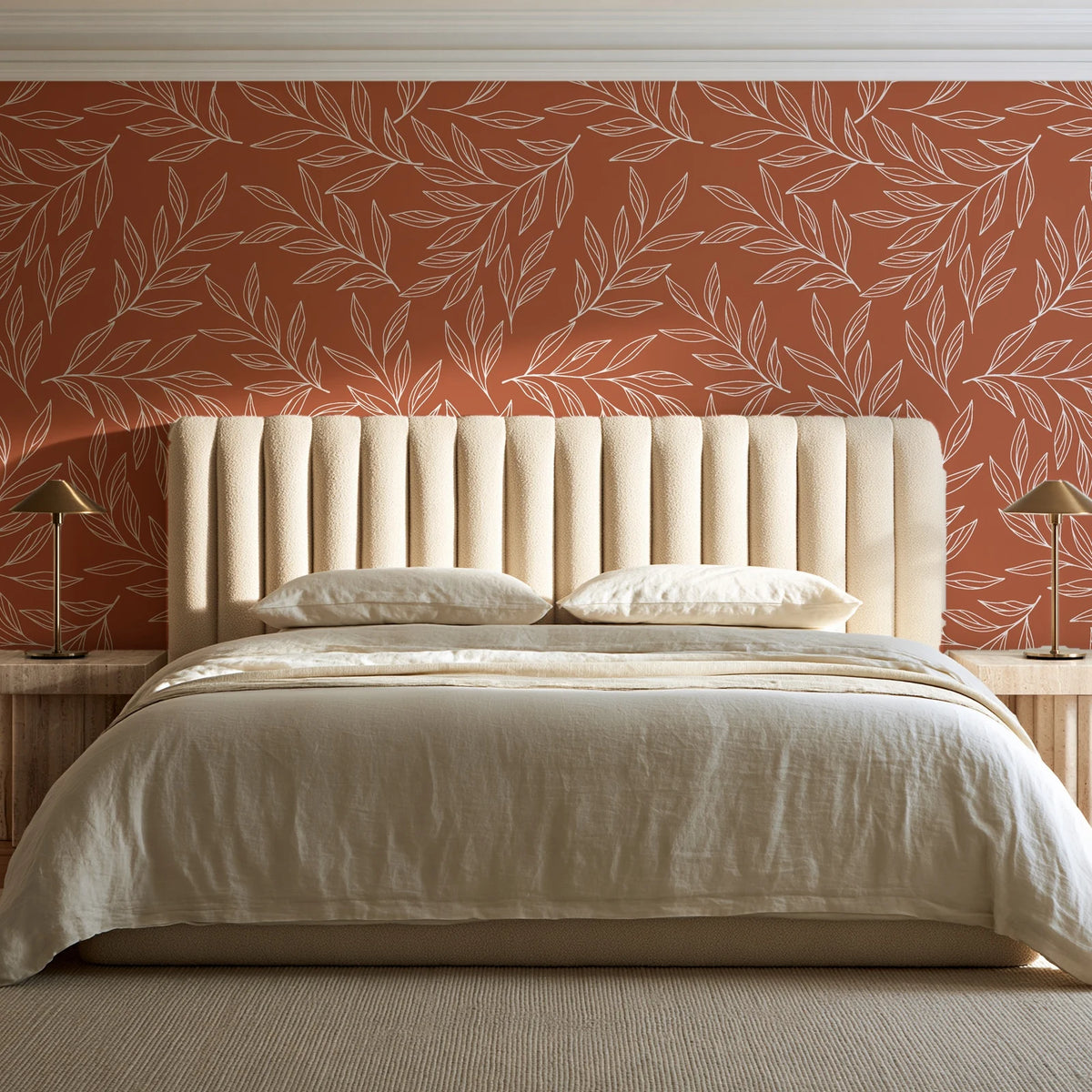 Forest Leaf Terracotta botanical leaf wallpaper behind a channel-tufted bed in a calm primary bedroom