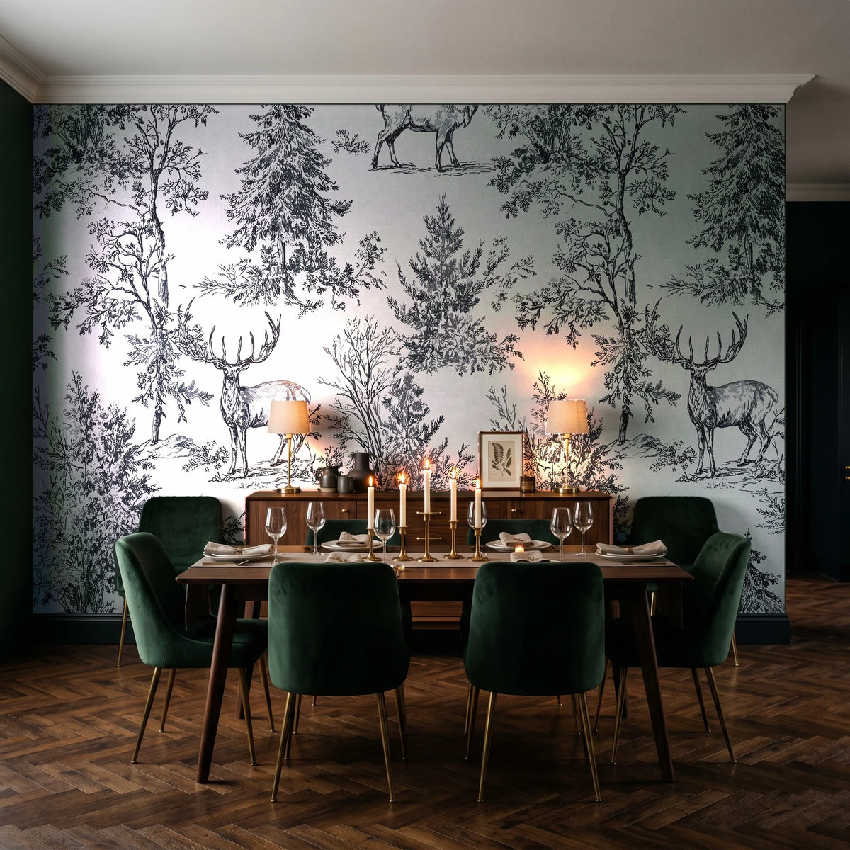Frost & Fable Graphite woodland toile wallpaper in a dark moody dining room with a candlelit table