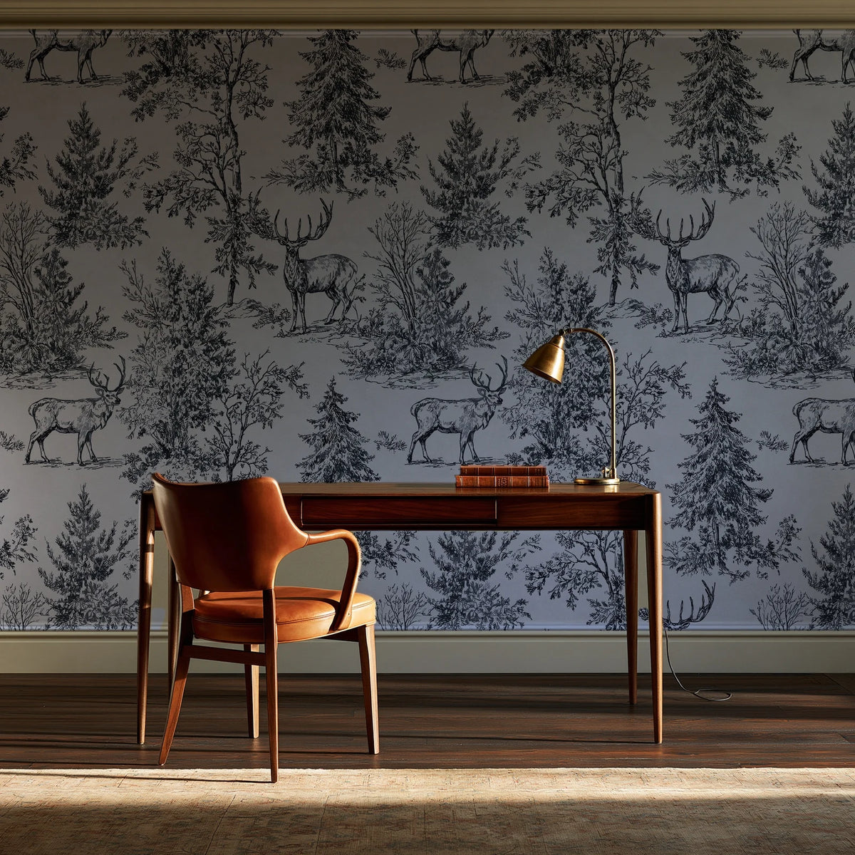 Frost & Fable Graphite woodland toile wallpaper as a feature wall in a home study