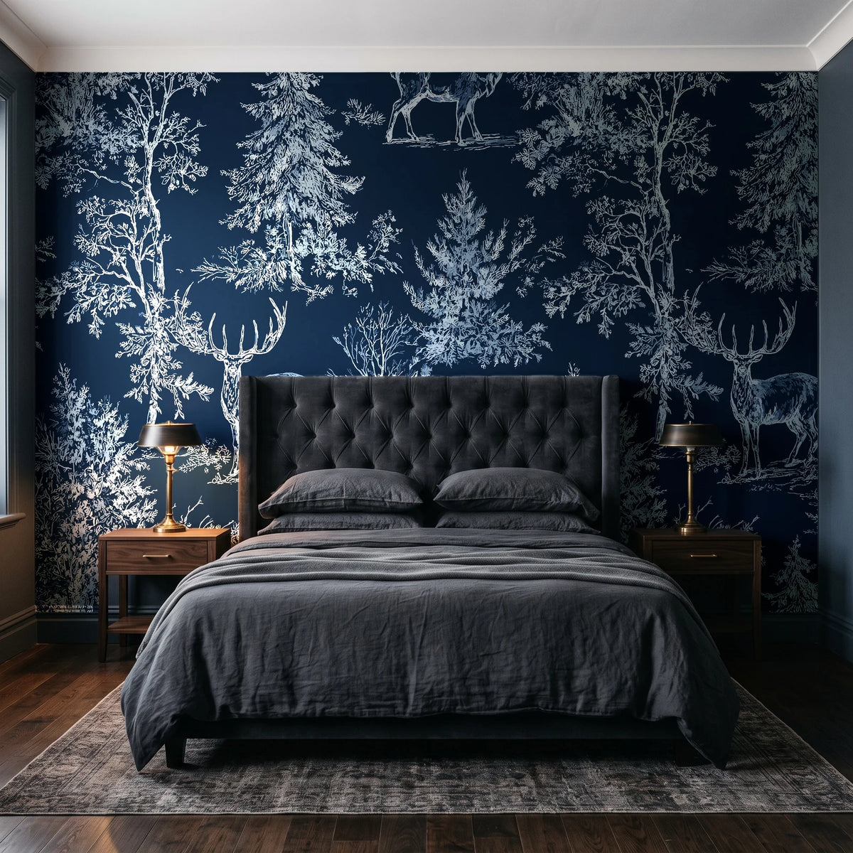 Frost & Fable Midnight woodland toile wallpaper behind a tufted headboard in a dark, moody bedroom