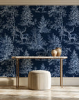 Frost & Fable Midnight woodland toile wallpaper on the wall of a grand entry foyer