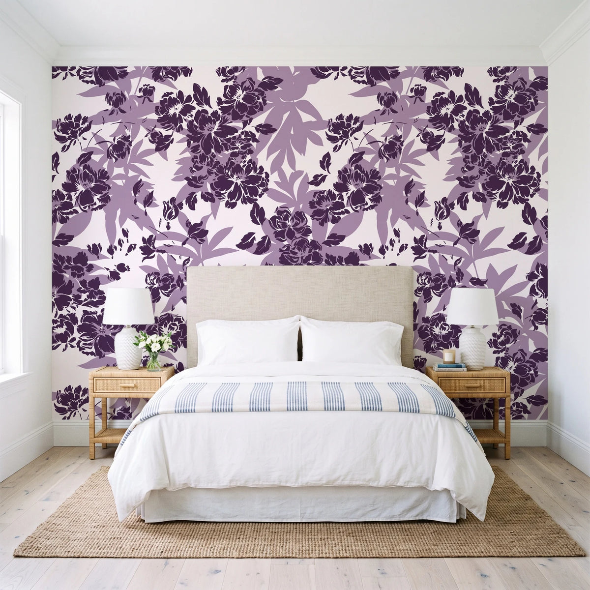 Frost Garden Veil Plum floral wallpaper behind a queen bed in a bright coastal bedroom