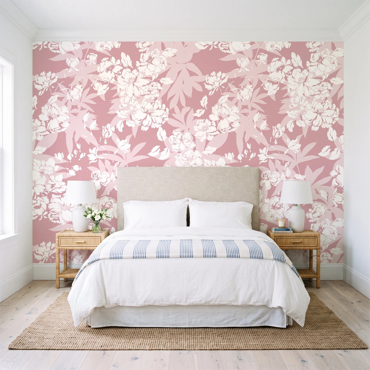 Frost Garden Veil Rose floral wallpaper behind a queen bed in a bright coastal bedroom