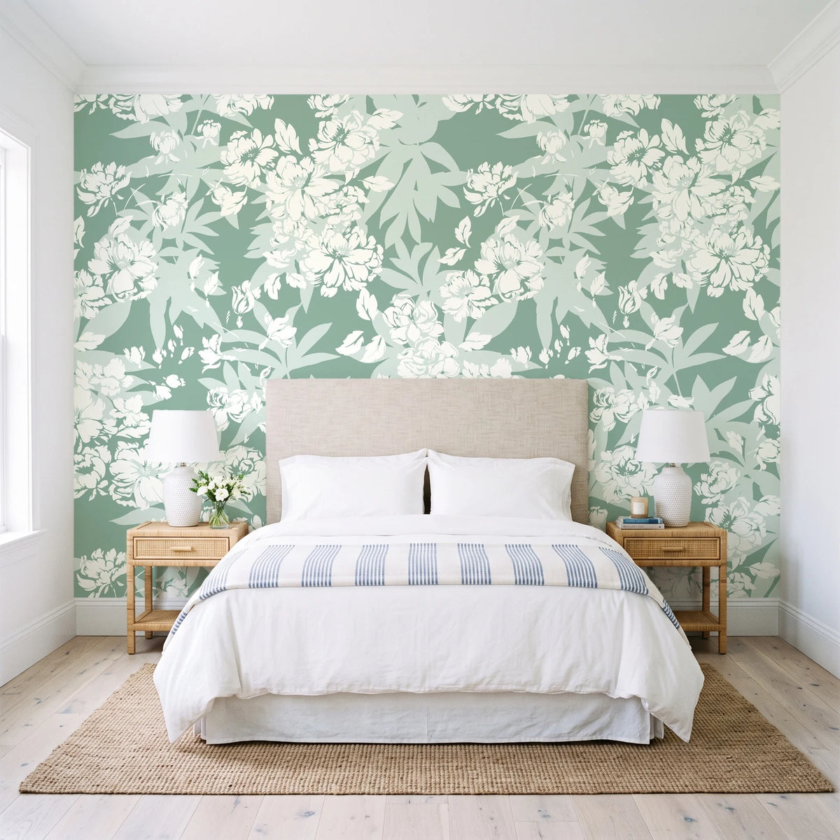 Frost Garden Veil Sage floral wallpaper behind a queen bed in a bright coastal bedroom