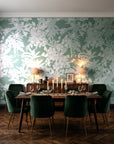 Frost Garden Veil Sage floral wallpaper in a dark moody dining room with a candlelit table