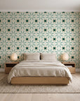 Frost Mosaic Emerald geometric tile wallpaper behind a low platform bed in a serene Japandi bedroom