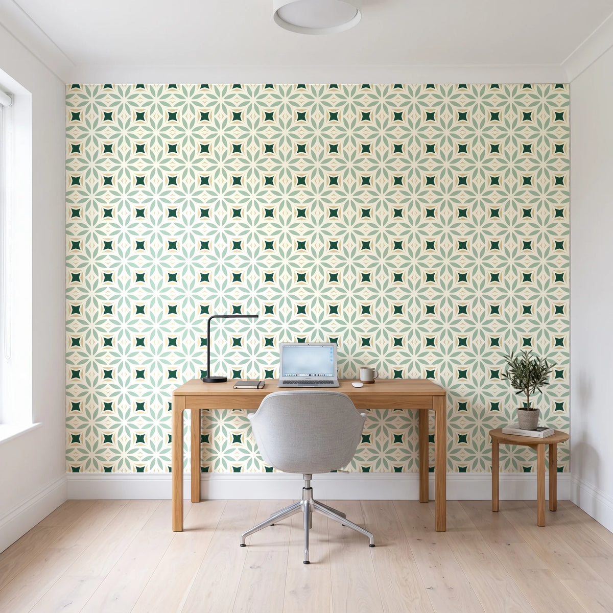 Frost Mosaic Emerald geometric tile wallpaper behind a modern oak desk in a bright home office