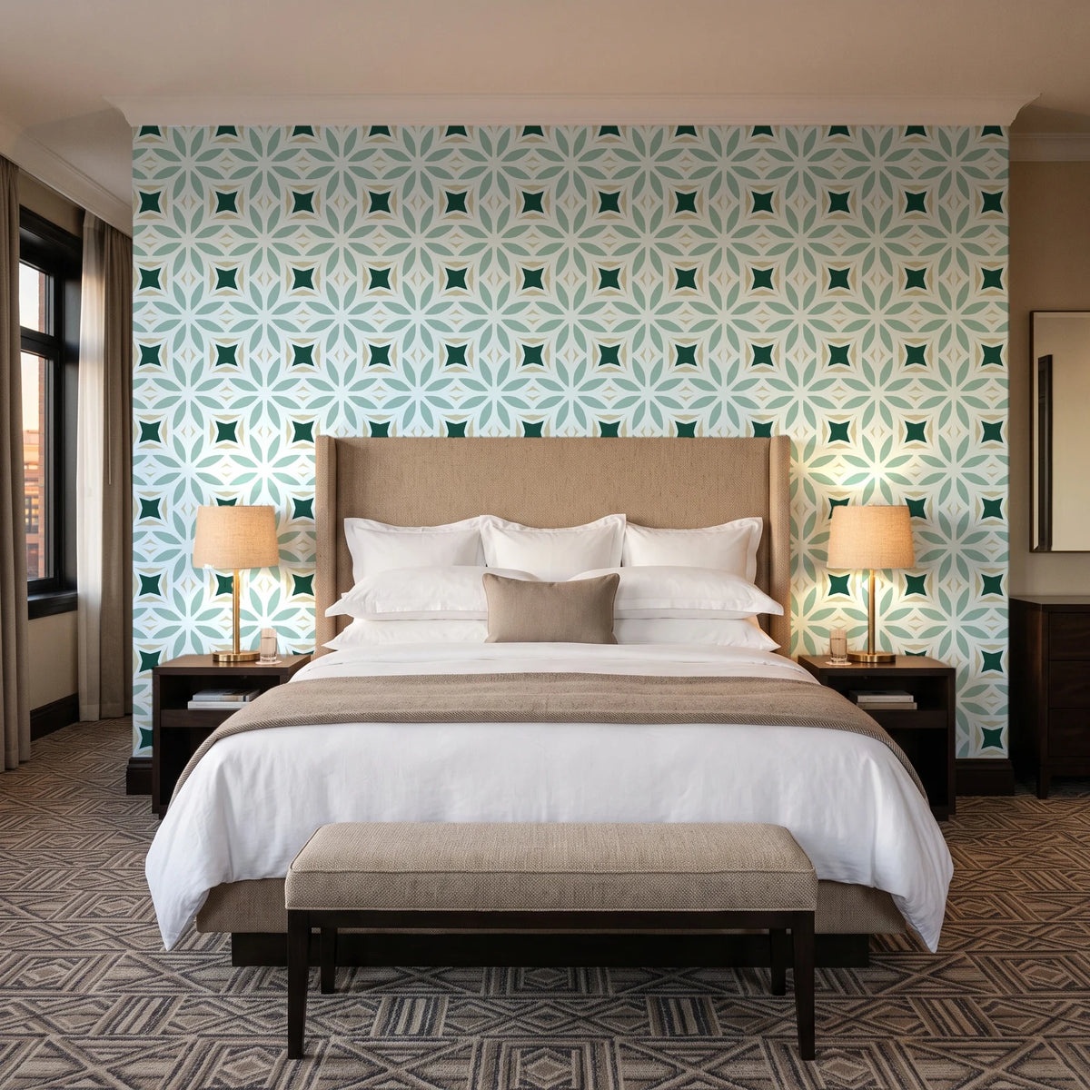 Frost Mosaic Emerald geometric tile wallpaper behind the headboard of a king bed in a contemporary hotel guest room