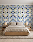 Frost Mosaic Midnight geometric tile wallpaper behind a low platform bed in a serene Japandi bedroom