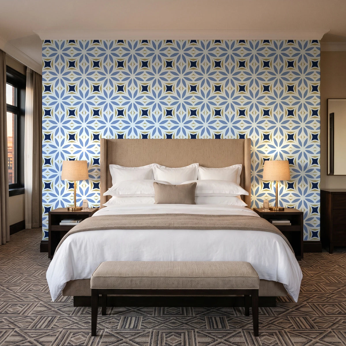 Frost Mosaic Midnight geometric tile wallpaper behind the headboard of a king bed in a contemporary hotel guest room