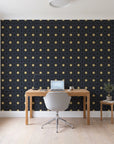 Frost Mosaic Noir geometric tile wallpaper behind a modern oak desk in a bright home office