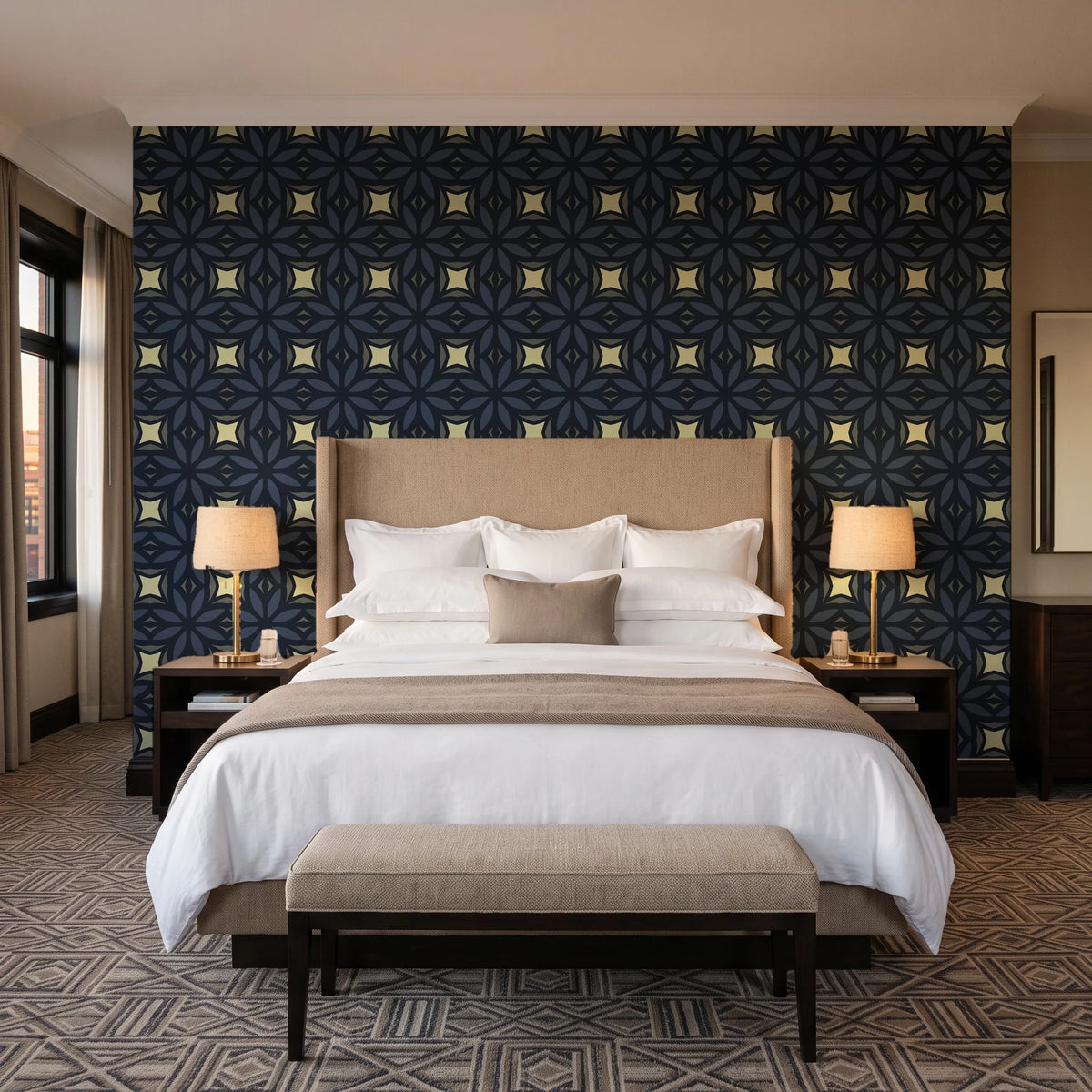 Frost Mosaic Noir geometric tile wallpaper behind the headboard of a king bed in a contemporary hotel guest room