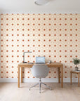 Frost Mosaic Terracotta geometric tile wallpaper behind a modern oak desk in a bright home office